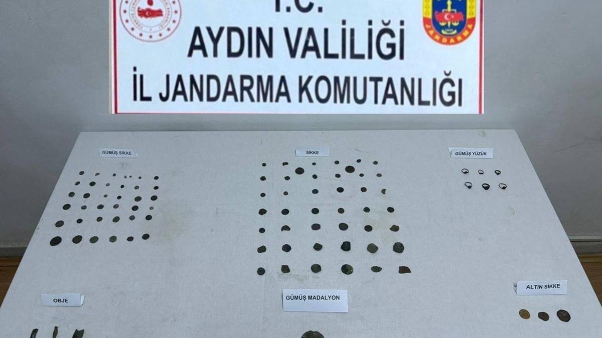 Jandarma, Germencik'te 1 milyon 300 bin liralk tarihi eser sat yapan phelileri yakalad