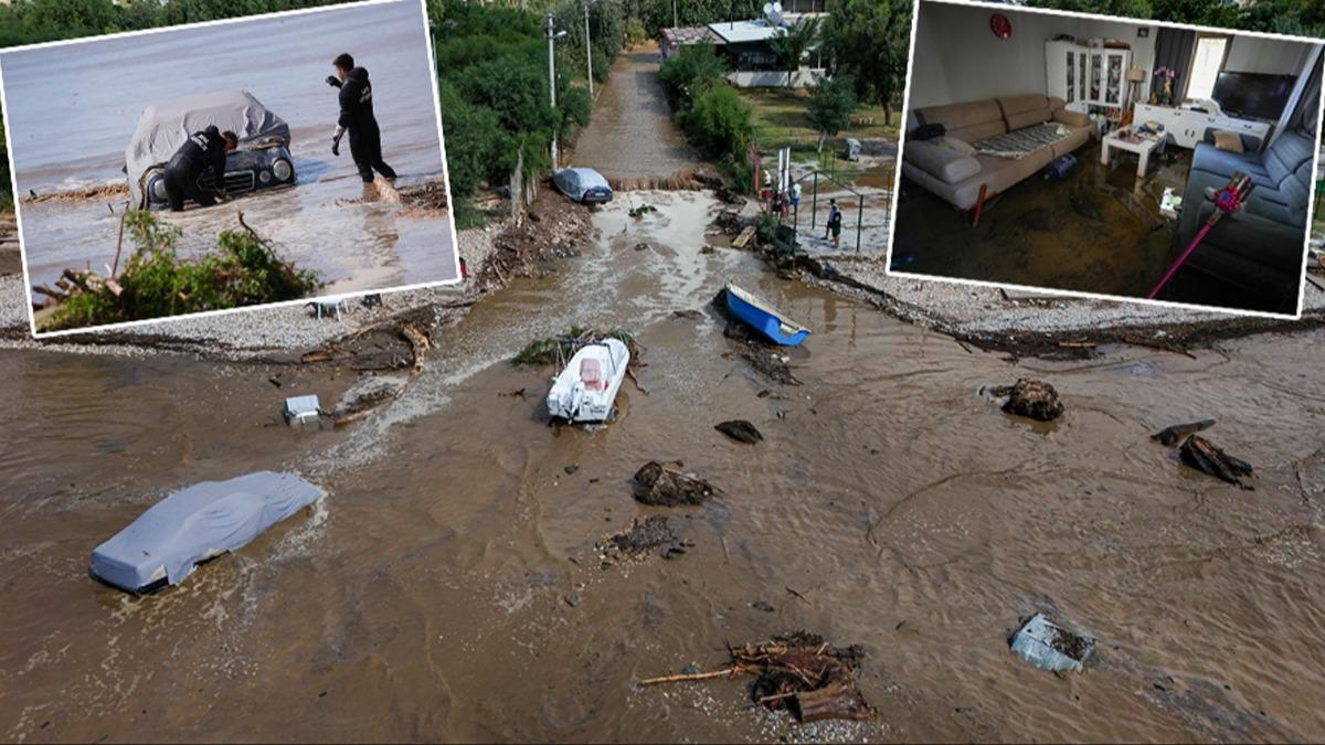 zmir'de iddetli saanak! Yol kt, evleri su bast