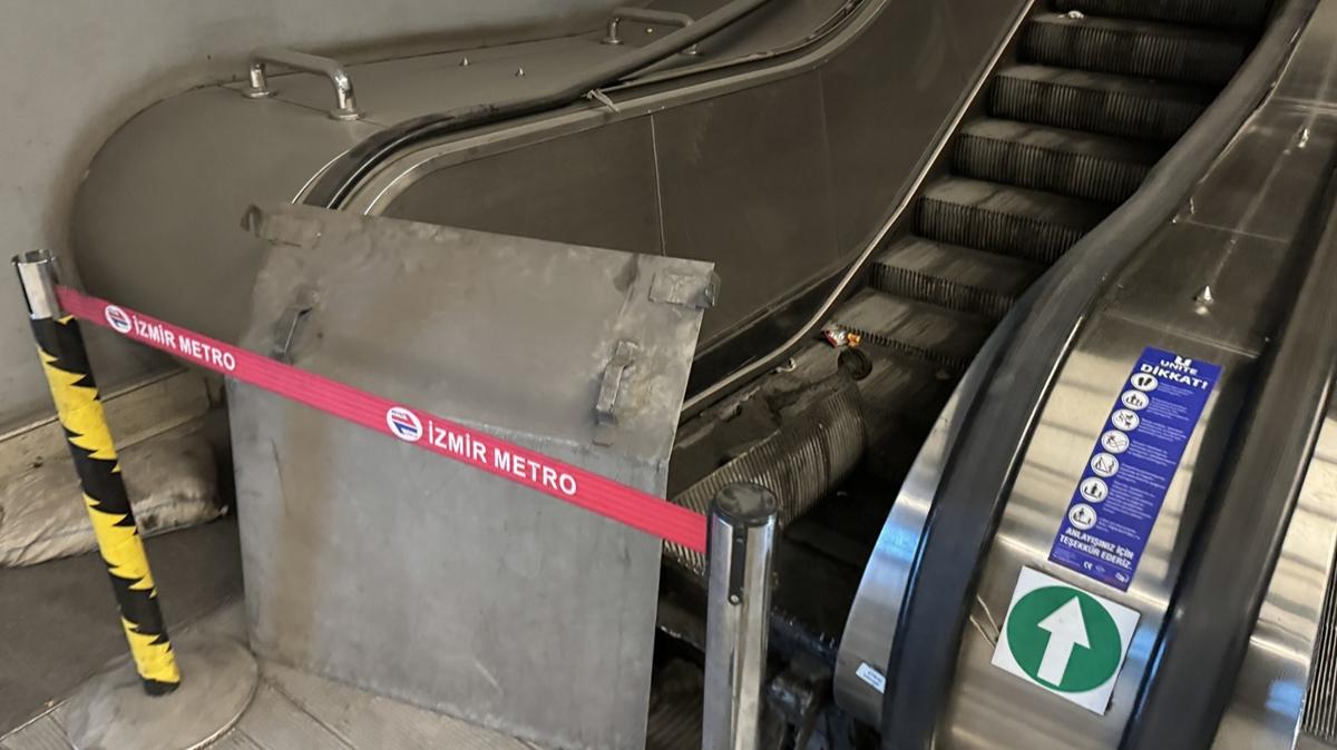 zmir Metrosu'nda yryen merdiven ilesi