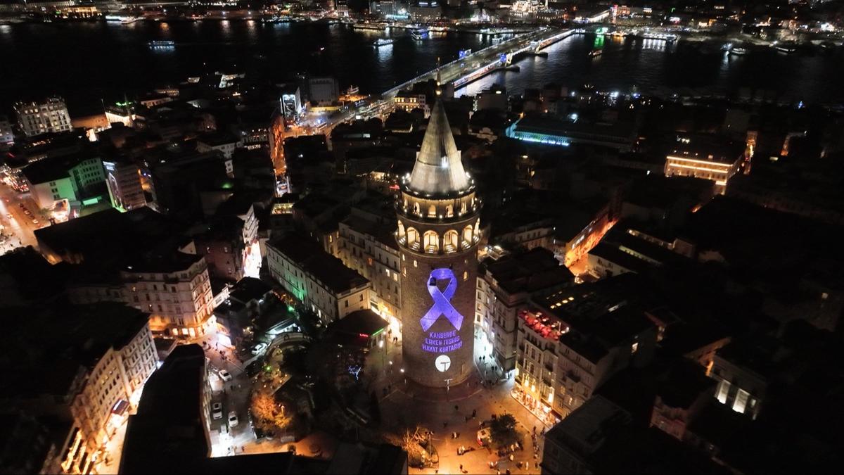 Galata Kulesi'ne 4 ubat Dnya Kanser Gn dolaysyla lila renkli kurdele yanstld