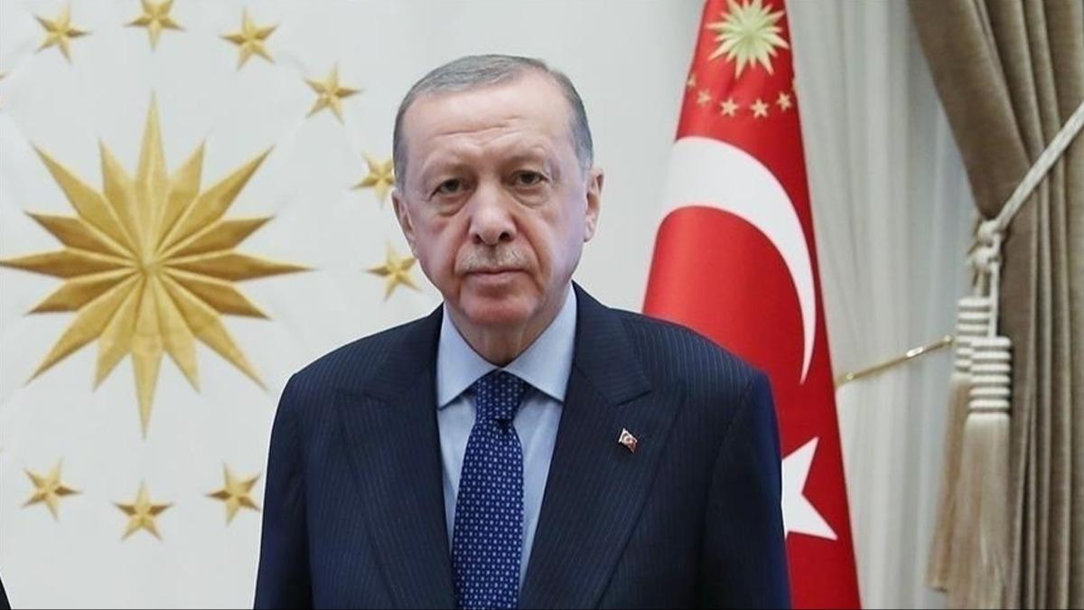 Cumhurbakan Erdoan, orman yangnnda ehit olan kahramanlarn ailelerine basal diledi