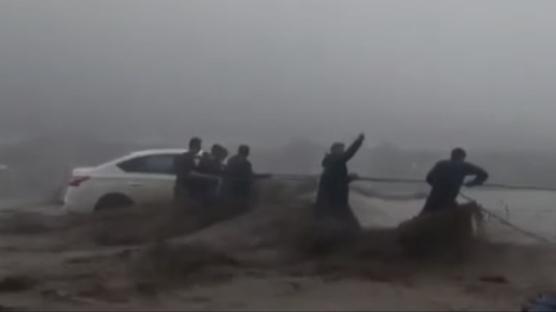 Arap lkeleri iddetli yalarla bouuyor! Irak'ta 2 kii hayatn kaybetti