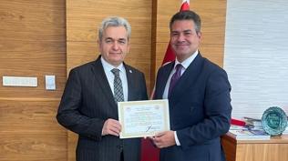 Yeniky Kemerky Enerji'ye 4 milyon fidan iin takdir belgesi