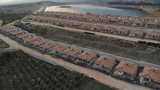 Y�l sonunda y�z� g�lmeyen depremzede kalmayacak