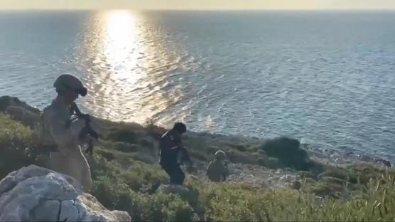 �zmir'de 14'� �ocuk 39 d�zensiz g��men yakaland�