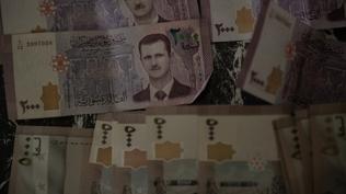 Suriye'de para birimi de�i�iyor... Yeni banknotlar tedav�le girdi