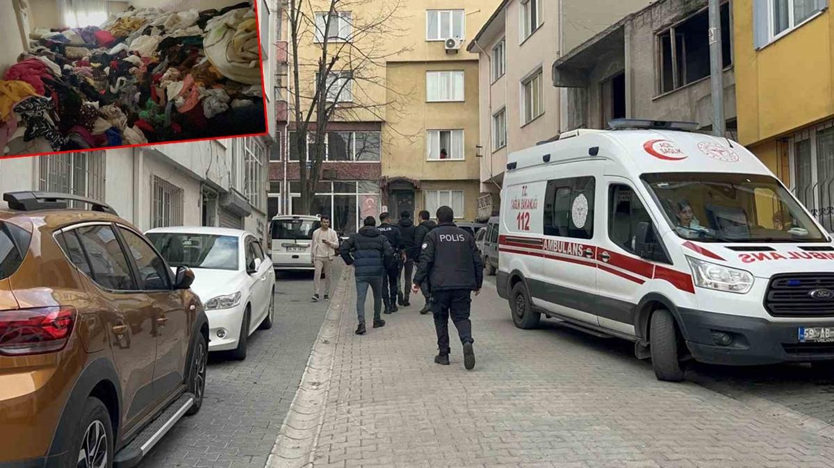 �stifledi�i giysilerin aras�ndan cans�z bedeni ��kt�