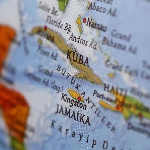 K�ba deniz s�n�r�nda hareketli anlar... ABD'den gelen tekne ate� a�t�