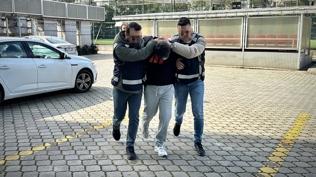 Interpol Rusya'da yakalad�, KOM ekipleri teslim ald�: Cinayet zanl�s� adaletten ka�amad�