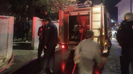 Karakoldan d�nd�, e�inin ailesinin evini ate�e verdi