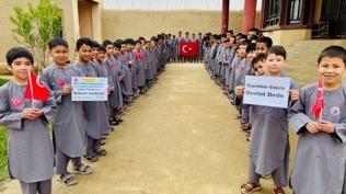 Bah�eli'den yetim T�rkmen �ocuklara bayram hediyesi