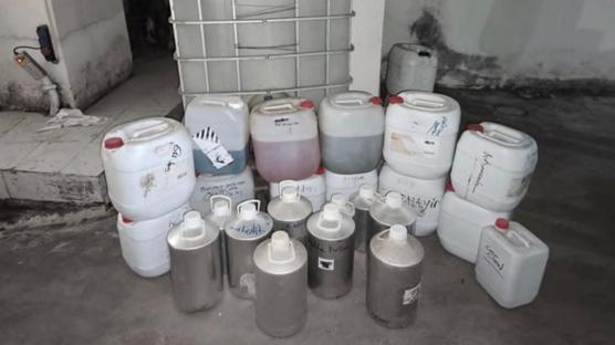 Polis şüpheli bidonların peşini bırakmadı! Depoda sahte parfüm imalathanesi bulundu