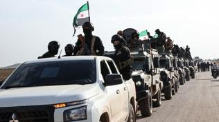 Suriye'de devrik rejim kal�nt�lar�na operasyon... Sava� su�lular� yakaland�