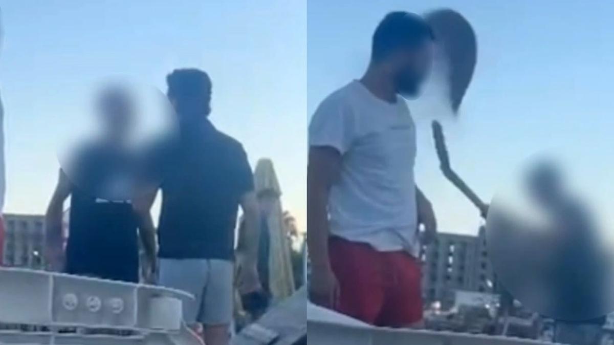 Plajda skandal g�r�nt�! Gen�leri kum f�rlatarak uzakla�t�rd�lar
