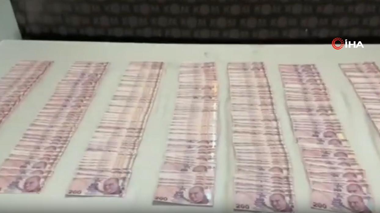 Kütahya'da kalpazan operasyonu: Yüzlerce sahte banknot ele geçirildi
