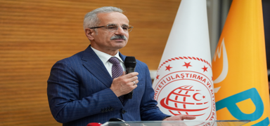 Bakan Uralo�lu: PTT bir d�nya markas� olma yolunda