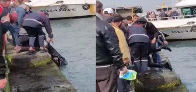 Emin�n�'nde trajik anlar: Seyahat ederken denize d��t�