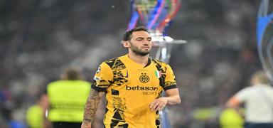 Hakan alhanolu, tarihe geti
