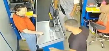 Markette dehet! Mteri kadn kasiyerin burnunu krd