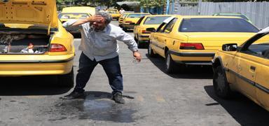 �ran'da y�ksek s�cakl�k alarm�: Devlet daireleri tatil edildi