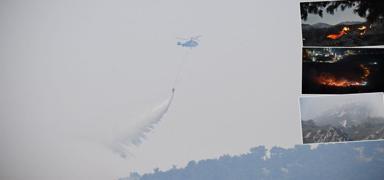 Alevlerle canla ba�la m�cadele