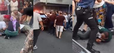 Sokak ortas�nda k�z arkada��n� b��aklayan �ahs� mahalleli lin� etti