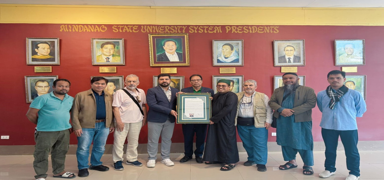 Terc�mesi Ba�kan Erdo�an'�n mektubuyla teslim edildi