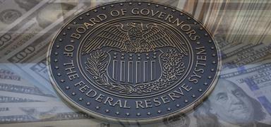 Fed'den y�l�n ilk faiz indirimi