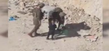 �ocuklara bile tahamm�lleri yok! Katil ordusundan tepki �eken g�r�nt�