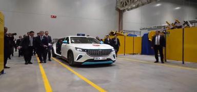 Cumhurbakan Erdoan zel retim arala trene geldi