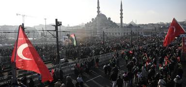 T�GVA'dan Filistin y�r�y���ne �a�r�