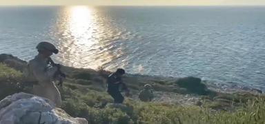 �zmir'de 14'� �ocuk 39 d�zensiz g��men yakaland�