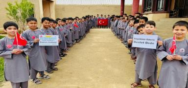 Bah�eli'den yetim T�rkmen �ocuklara bayram hediyesi